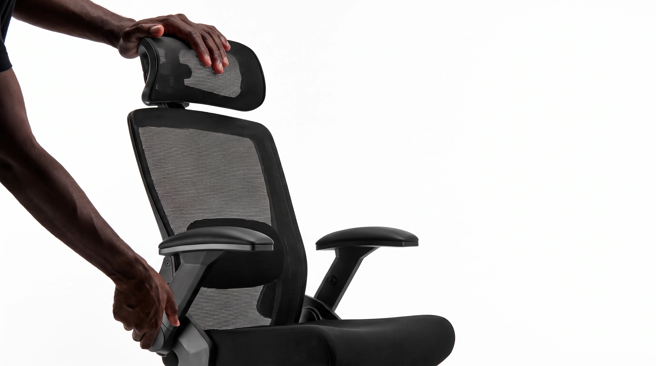 A close view of a person adjusting the headrest and backrest of a VALOUR chair